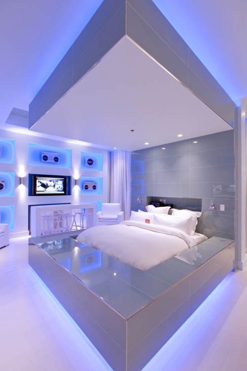 Premium twin room with modern lighting and storage.
